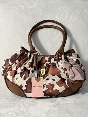 Viral Juicy Couture Brown and White Cow Print Shoulder Bag with Bow Accent